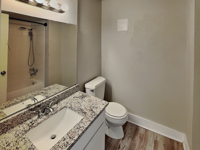 Building Photo - Stylish Upstairs Condo with Fireplace, Pri...