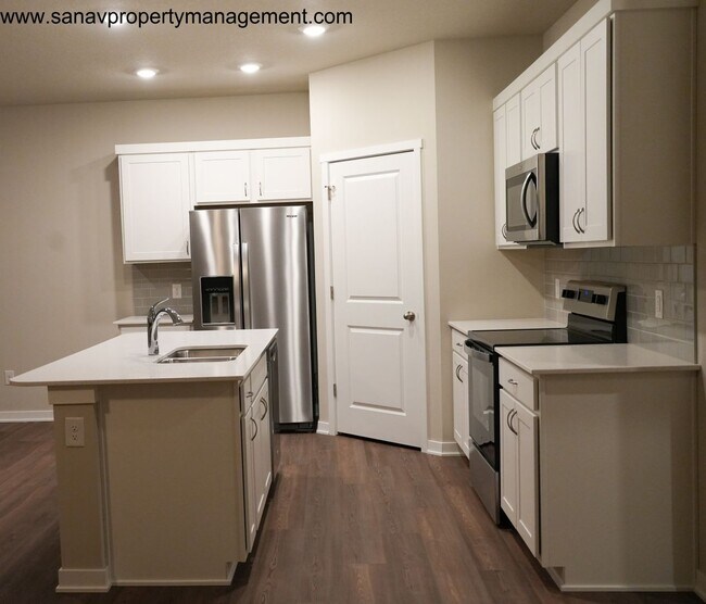 Building Photo - "Ranch Retreat: Seamless Serenity in Single-Level Splendor with Trailside Tranquility"