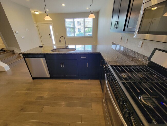 Building Photo - Spacious 3 level, 4 bedroom townhome with attached 2 car garage at Silver Meadows Townhomes on Lo...