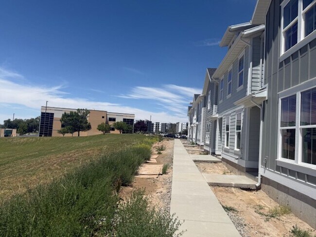 Building Photo - Half off first months rent - Beautiful new construction town home