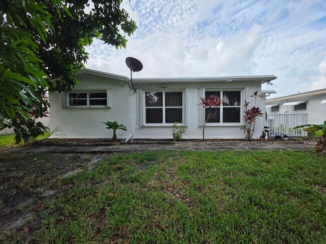 Building Photo - 7195 NW 9th Ct