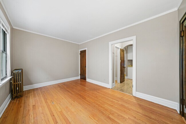 Building Photo - Sunny, Convertible Studio with Two Rooms a...