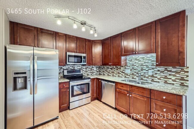 Building Photo - 3465 South Poplar-J102