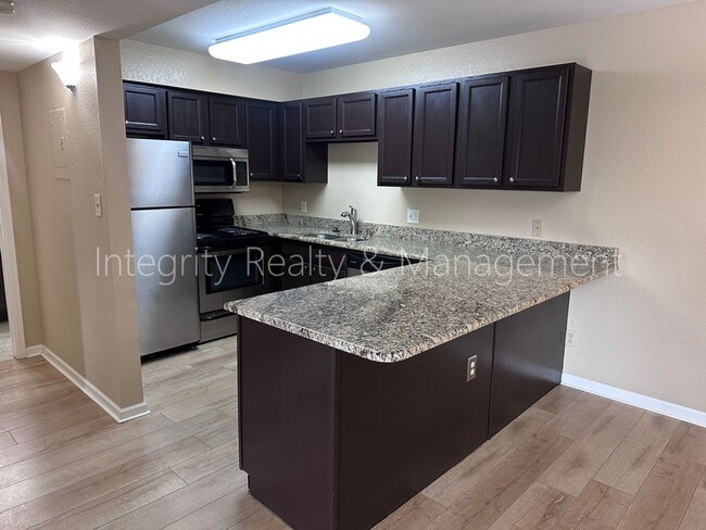 Building Photo - 13095 W Cedar Dr