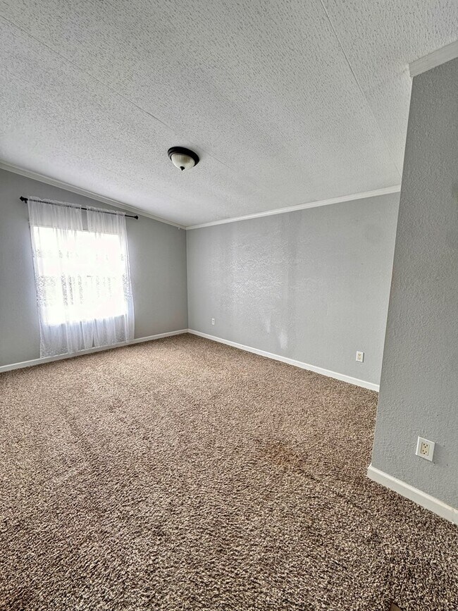 Building Photo - 10136 W University Blvd