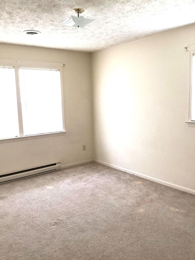 Building Photo - Spacious 3-Bed, 2.5-Bath Ranch-Style Home with Garage & Patio