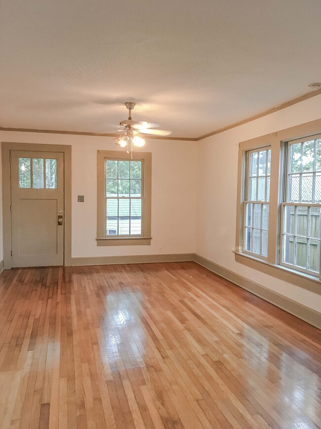 Master bedroom is large enough for bed and separate sitting area. - 527 McDaniel St