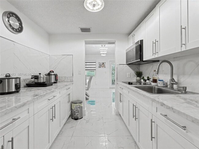 Building Photo - 9560 NW 32nd Ave