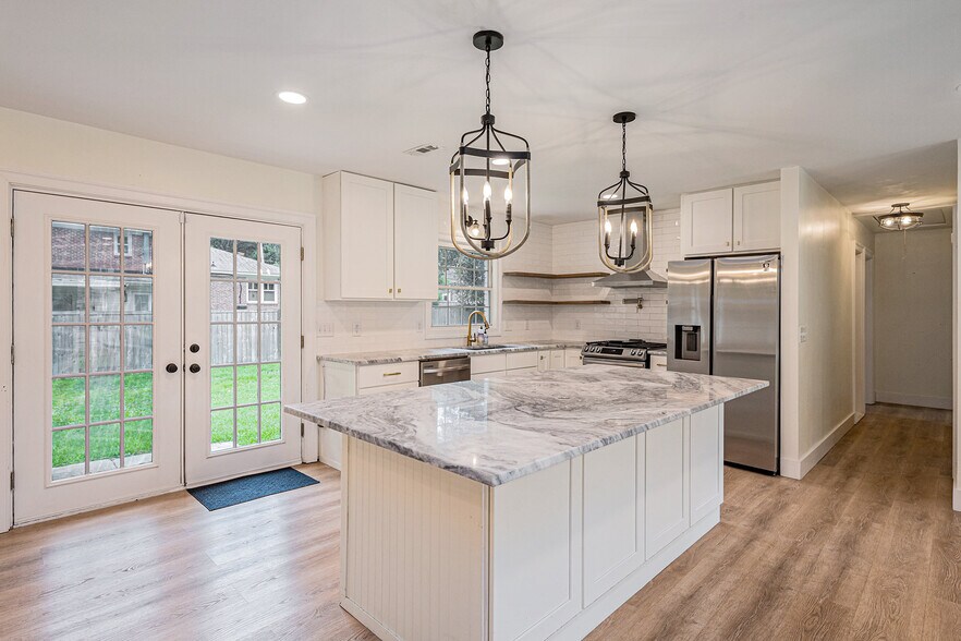 Kitchen with large island and all new appliances - 1816 Gippy Ln