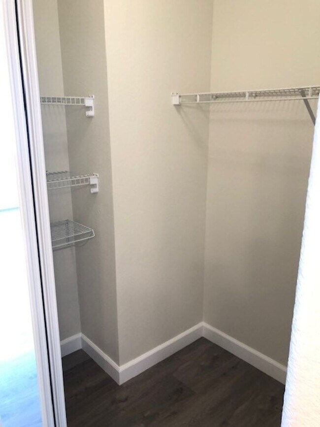 Building Photo - PICTURE PERFECT 2 BR/2 BATH PLUS LOFT END UNIT CONDO WITH DIRECT ACCESS 2 CAR GARAGE