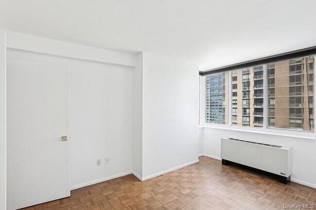 Building Photo - 4-74 48th Avenue Unit 21-E