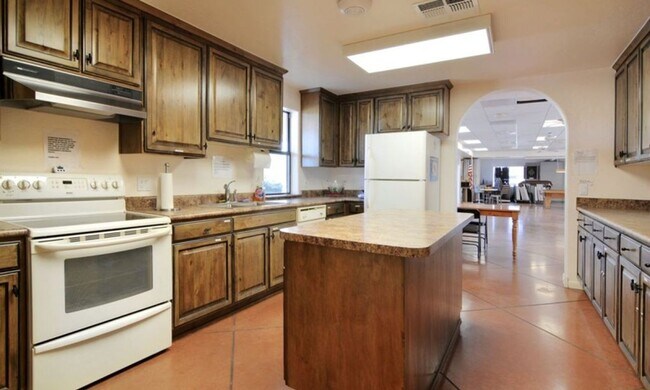 Building Photo - The art of living well in a thriving 55+ community