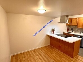 Building Photo - Spacious & Stylish 1-Bedroom Condo in the ...