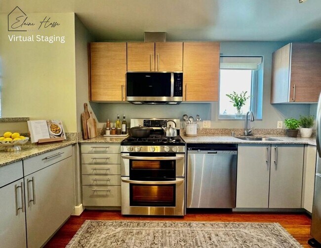 Building Photo - Corner Light. City Energy. Zero Compromise.