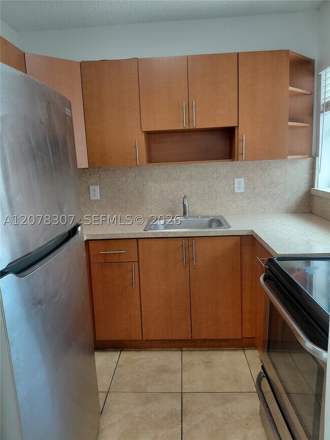 Building Photo - 5461 W 24th Ave