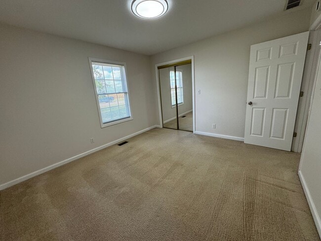 Building Photo - 4 Bedrooms, Big Yard & Top Schools – Don’t...