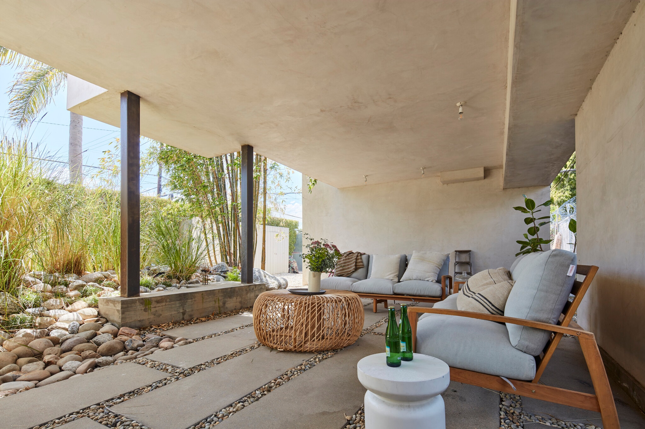 The entire house floats above half the yard, forming a 40' covered pavillion that is always cool and - 703 Palms Blvd