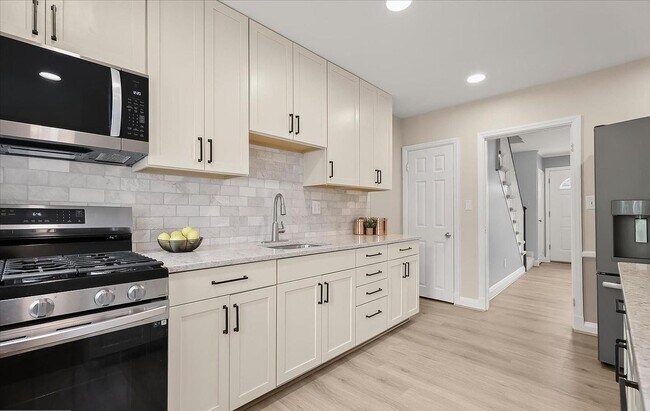 Building Photo - Updated 3BR Catonsville Townhome | Rear Parking + Deck