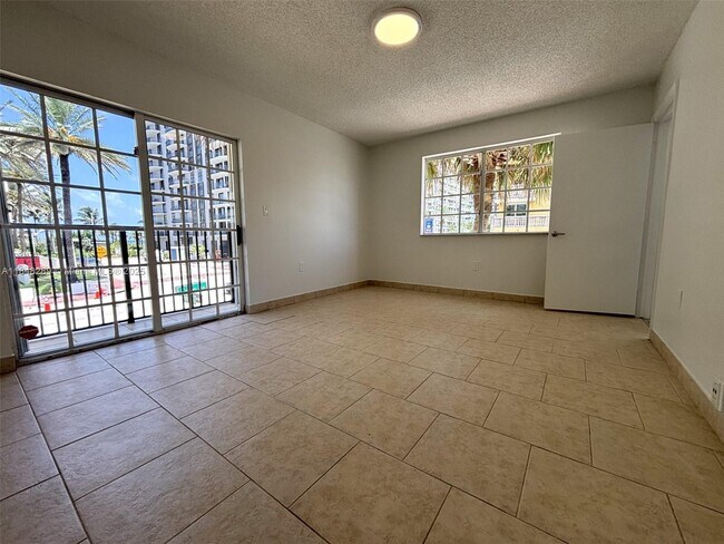 Building Photo - 8900 Collins Ave