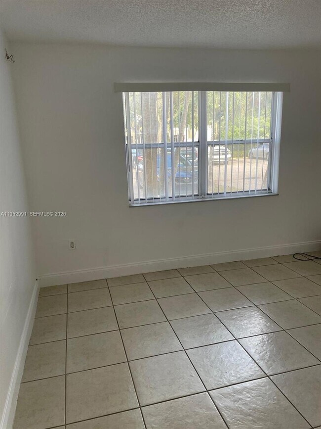 Building Photo - 4215 N University Dr