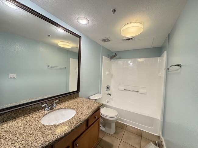 Building Photo - Magnificent 1 Bedroom Condo in Triana in Corona Ranch