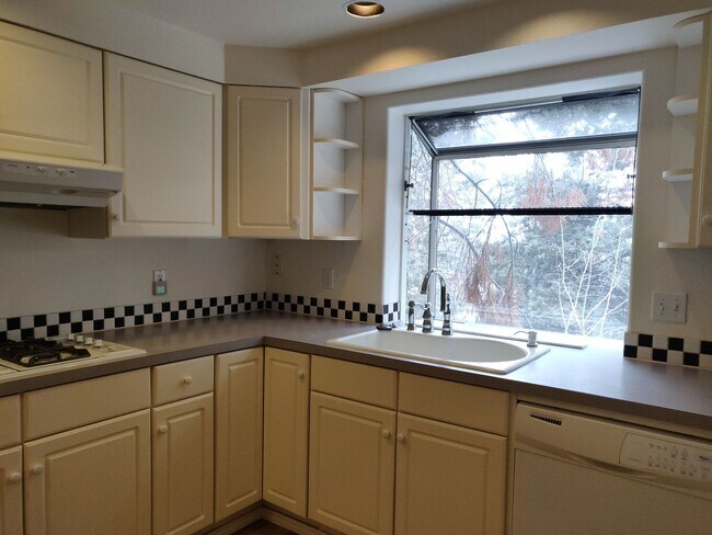 Building Photo - Spacious and charming, this two-story 4 be...