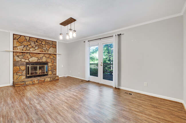 Large open concept living/dining that leads out to new deck - 5540 Kaplan Dr