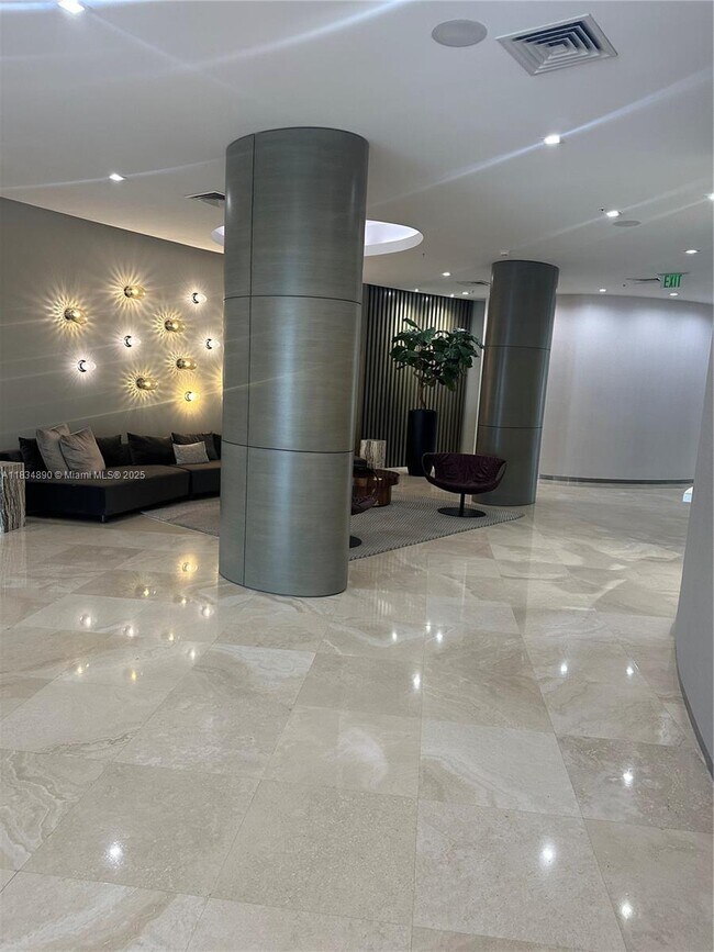 Building Photo - 10275 Collins Ave