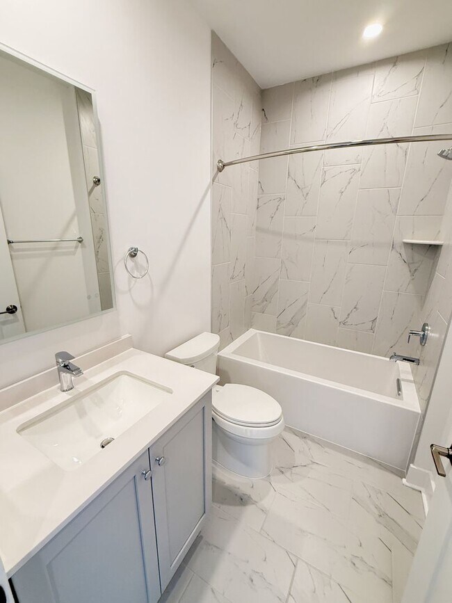 Building Photo - Brand new 4 level, 4 Bedroom Townhome with Elevator!