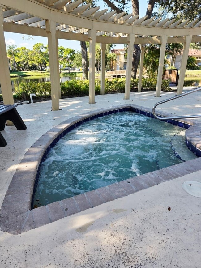 Building Photo - 4863 Via Palm Lakes