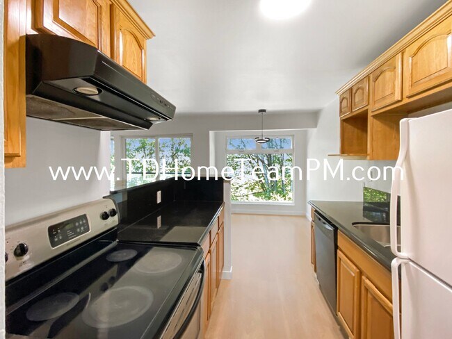 Building Photo - "Chic 2-Bed Condo with Scenic Views & Gran...