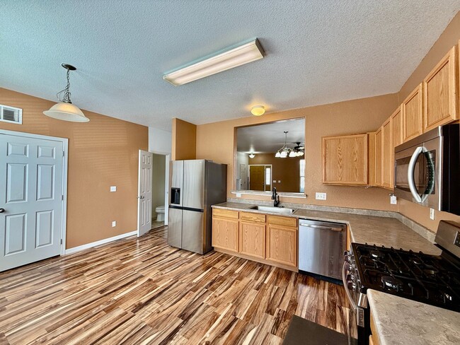 Building Photo - Stunning Townhome in Fountain, CO — Mountain Views, Corner Lot, Minutes from Fort Carson & Peters...