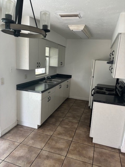 Building Photo - 1703 N Pompano Ave