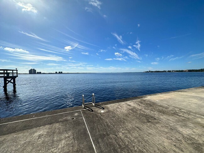 Building Photo - STUNNING 2/2 RIVERFRONT RENTAL IN KEY HARBOR