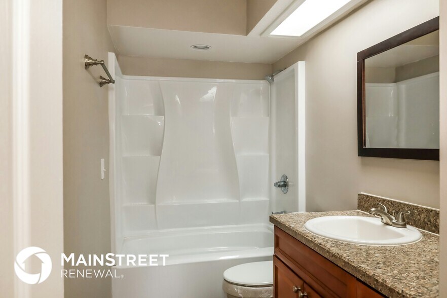 Building Photo - 9845 Paddlewheel Dr W