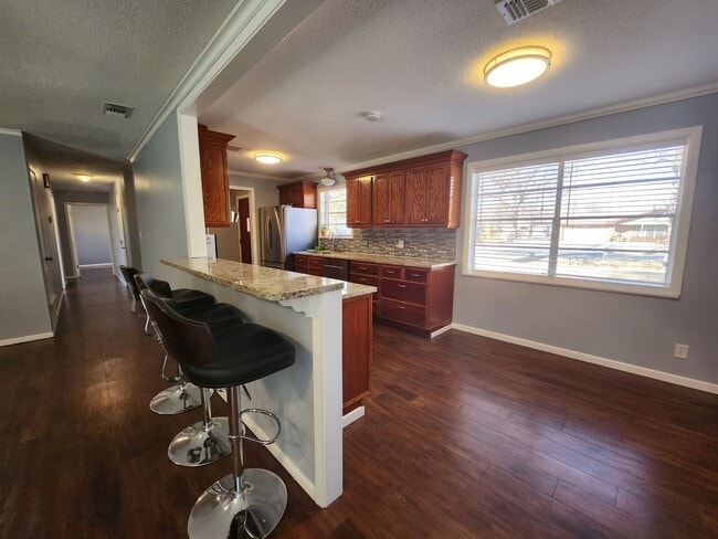Building Photo - Available Now, PG 4 Bedroom