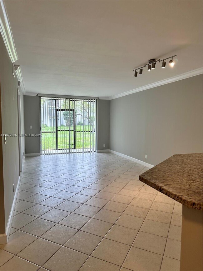Building Photo - 8750 N Sherman Cir