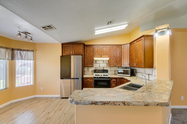 Building Photo - Updated Mediterranean-Style Home with Priv...