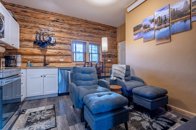 Building Photo - Charming Log Cabin and Carriage House – Do...