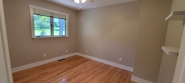 Building Photo - Beautiful home with peek a boo views of West Bay on Old Mission Peninsula