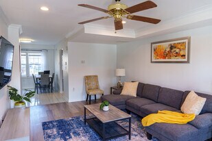 Fully furnished living room with flat screen - 8439 Pioneer Dr