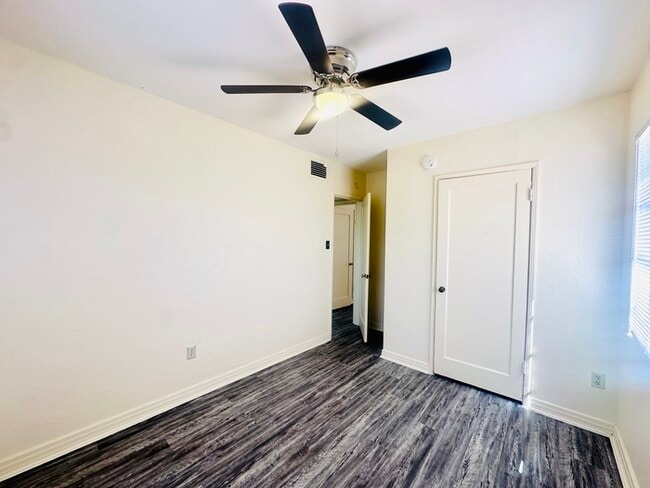 Building Photo - New Flooring! Spacious Private Yard with W...