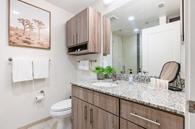 Building Photo - Midtown Magic: Big Savings + Big Perks!