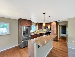Building Photo - Beautiful 4BD/2BA W/ 2-Car Garage, AC, and...
