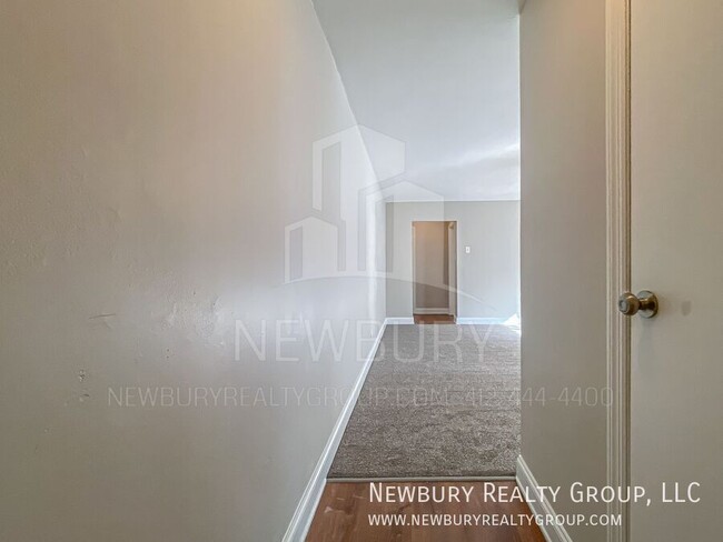 Building Photo - Modern One-Bedroom Apartment in Port Vue: ...