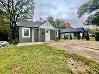 Building Photo - Welcome to this stunning 3-bedroom, 2-bath...