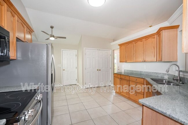 Building Photo - 6305 Trevor Simpson Dr