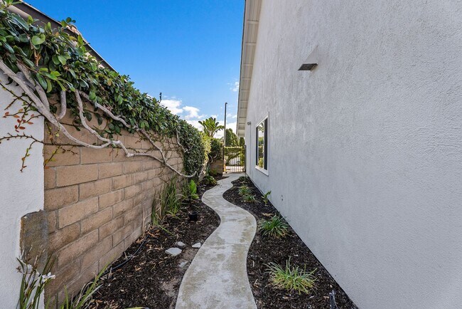 Building Photo - Coastal Elegance Meets Family Comfort in D...