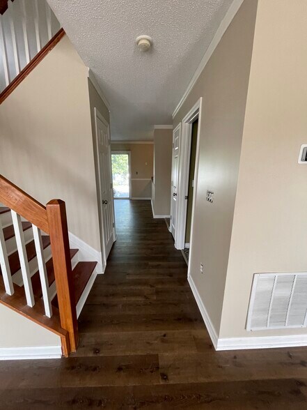First floor- 1/2 bath, 2 closets, dining room and galley kitchen - 1419 Founders Way