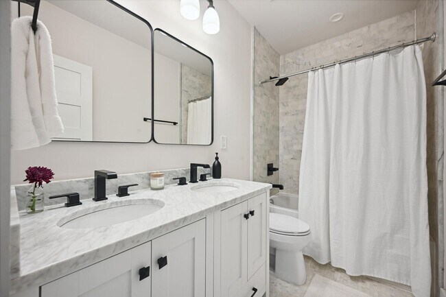 Building Photo - FURNISHED style in NoMA with Garage Parking